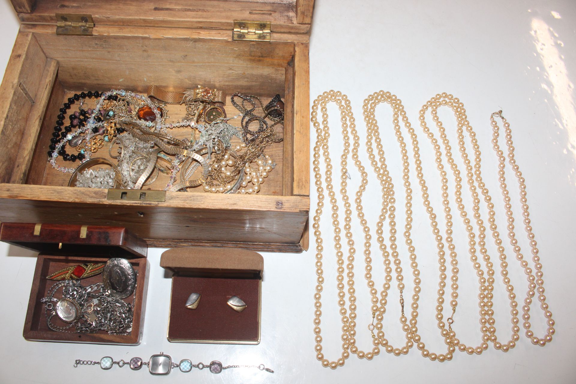 A pine box and contents of various jewellery to in
