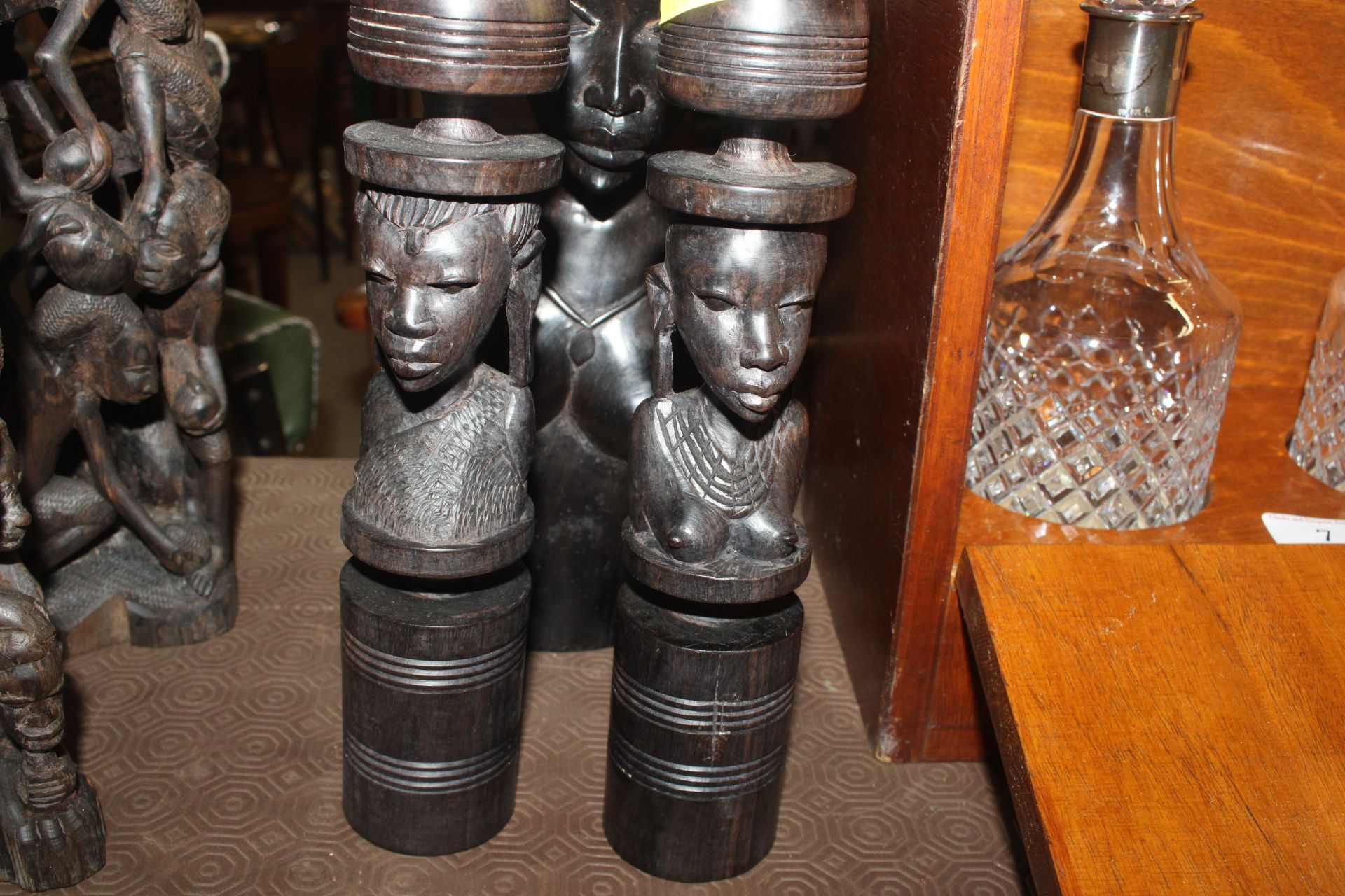 A carved hardwood African bust of a female and a p - Image 2 of 6