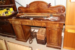 A Victorian mahogany pedestal sideboard
