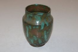A Rye pottery vase with green and brown mottled gl