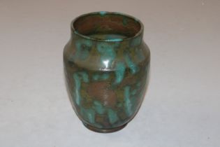 A Rye pottery vase with green and brown mottled gl