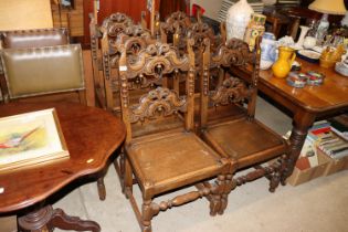 A set of six carved oak Derbyshire type chairs