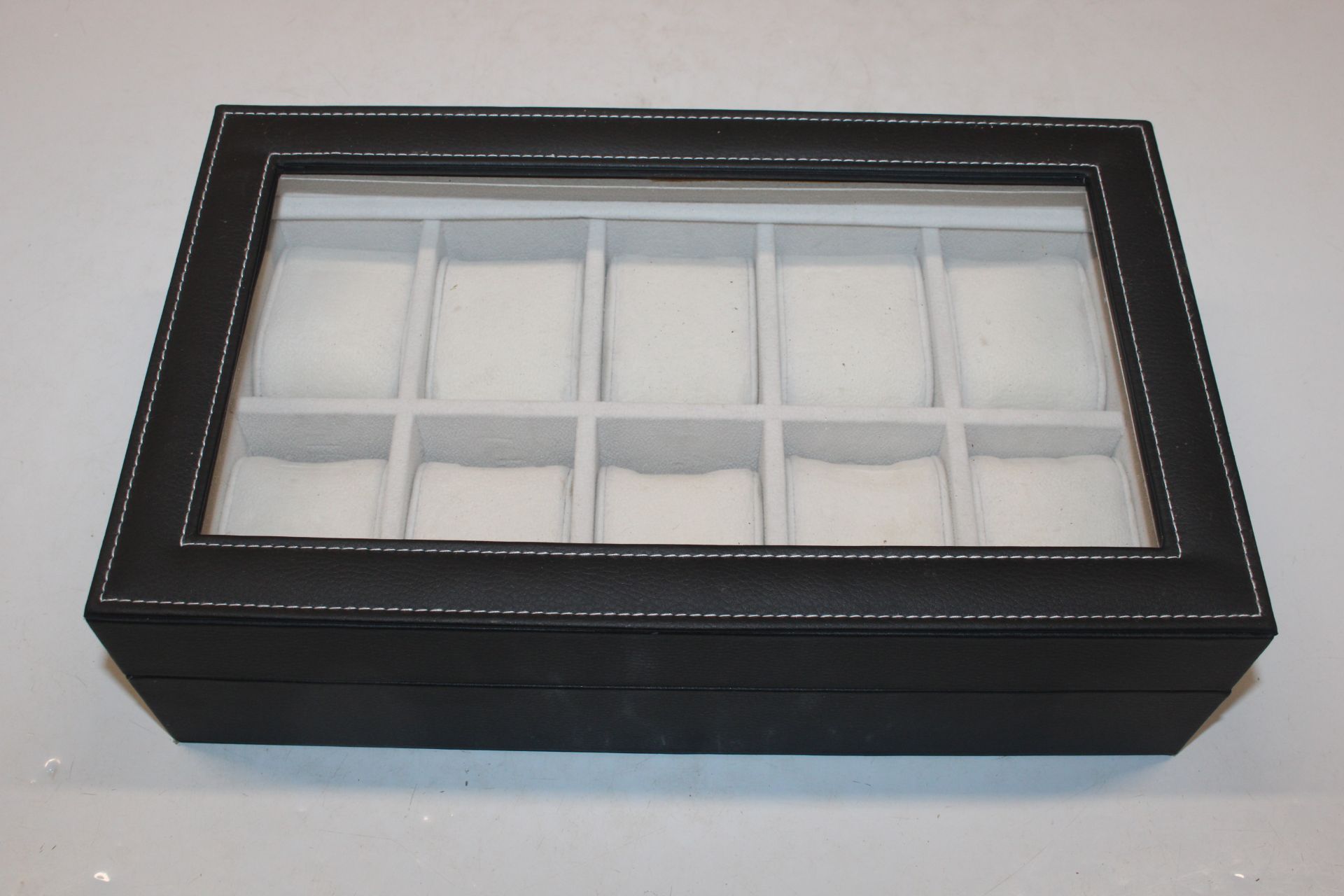 A ten compartment watch case