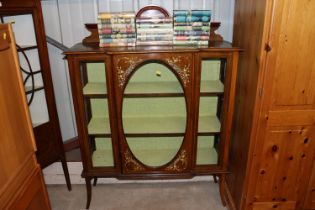 An Edwardian mahogany inlaid and painted display c