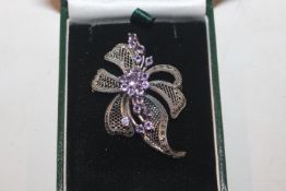 A Sterling silver and amethyst set brooch, approx.