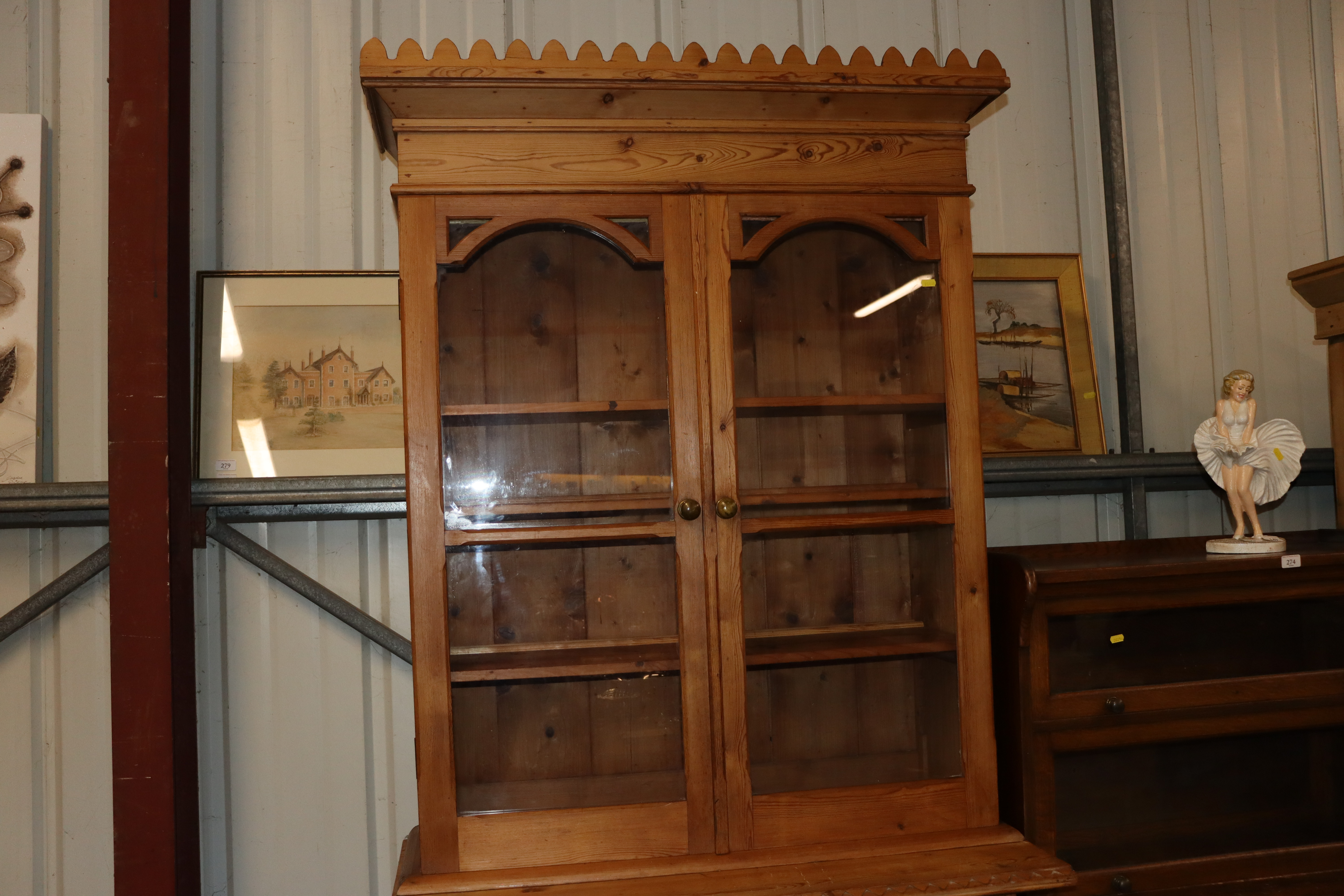 A 19th Century continental stripped pine bookcase on cupboard base - Image 4 of 4