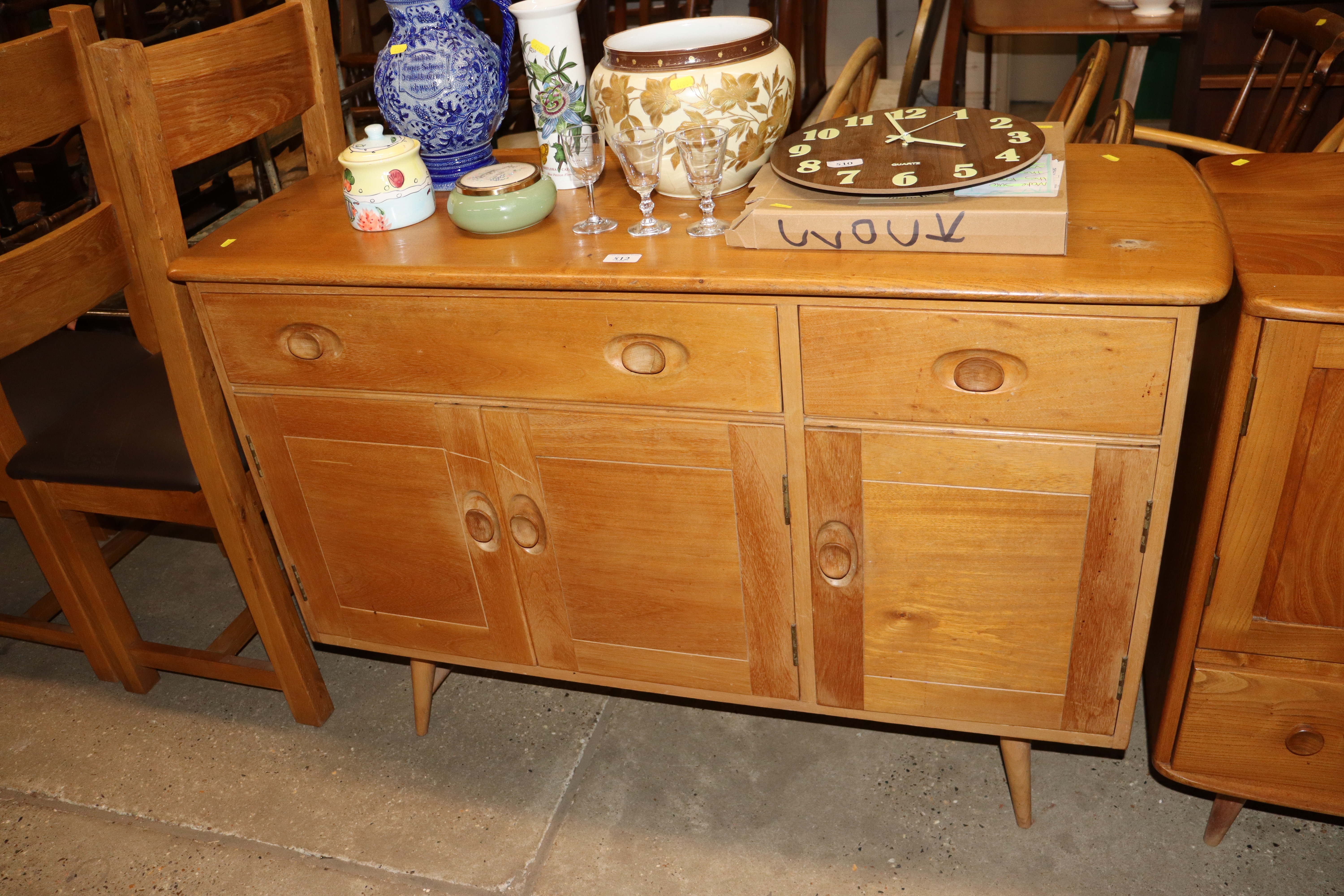 A blonde Ercol sideboard 120cm wide