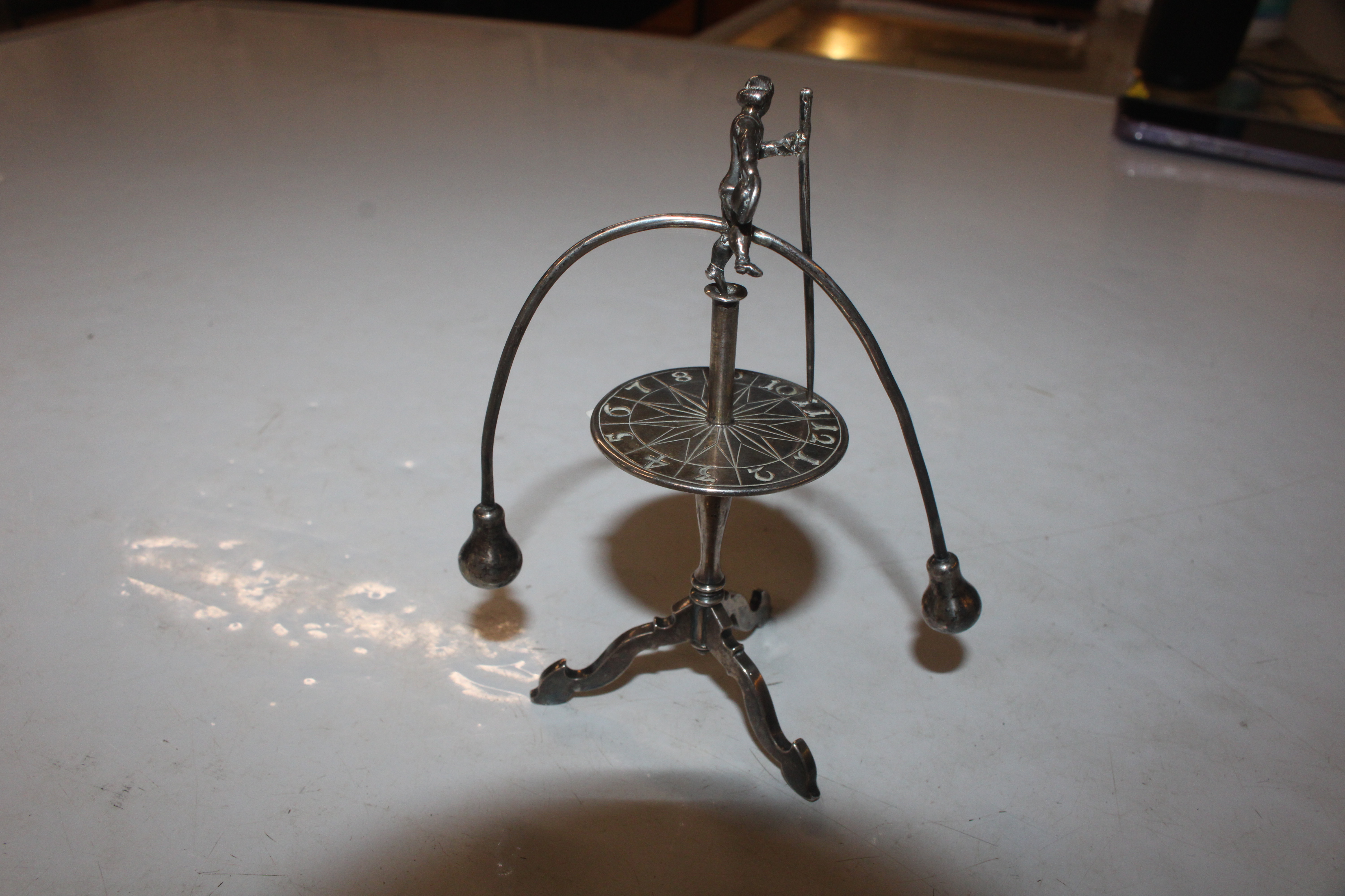 A Dutch silver roulette man, raised on tripod base - Image 3 of 11