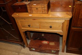 A light elm two drawer side table