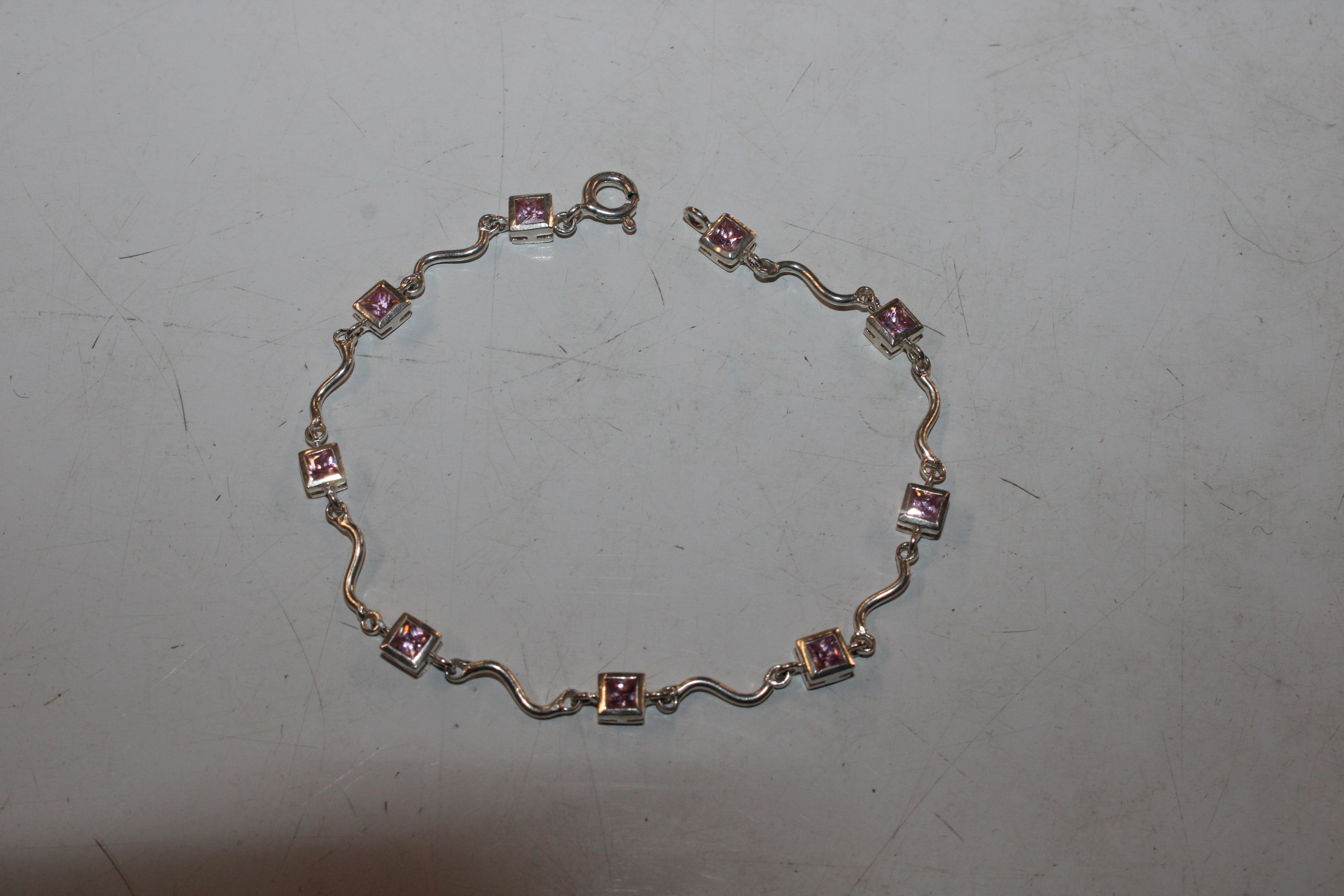 A Sterling silver and pink topaz bracelet and ear- - Image 5 of 7