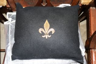 A Toye Kenning & Spencer Ltd of London gilt thread Fleur de Lys decorated cushion