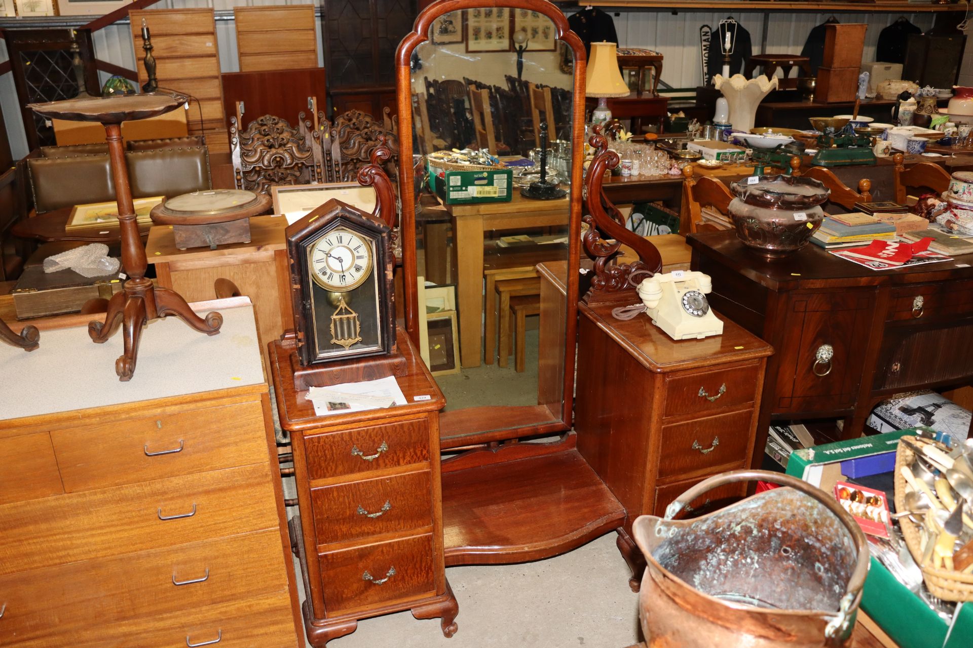 A twin pedestal mahogany dressing table with centr