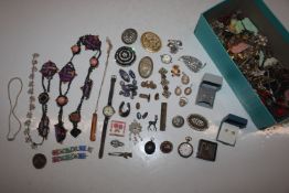 A box containing various costume jewellery; a micr