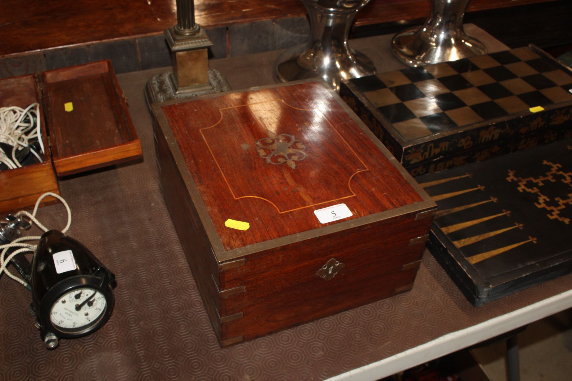 A rosewood and brass mounted travelling toilet box