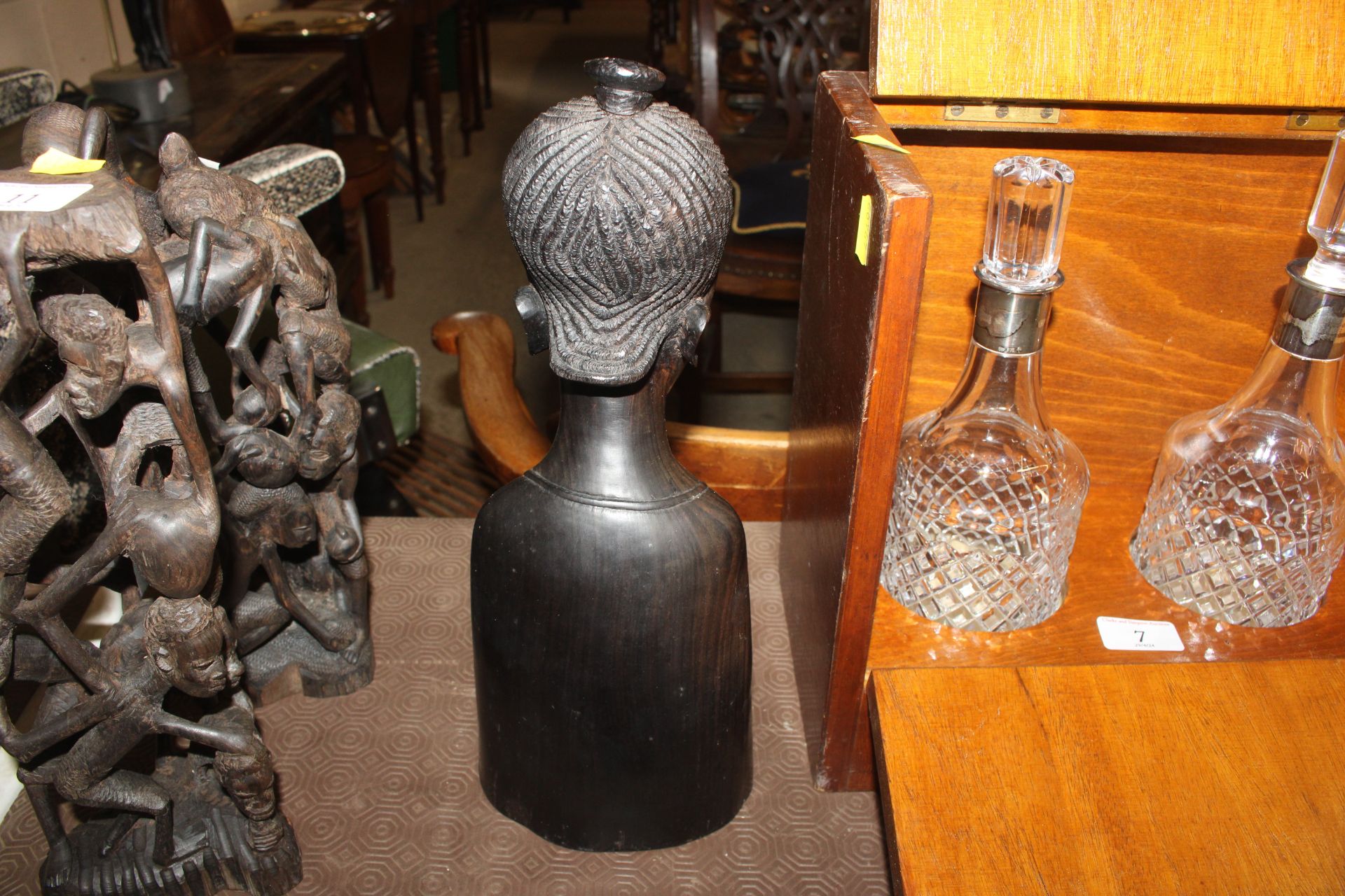 A carved hardwood African bust of a female and a p - Image 6 of 6