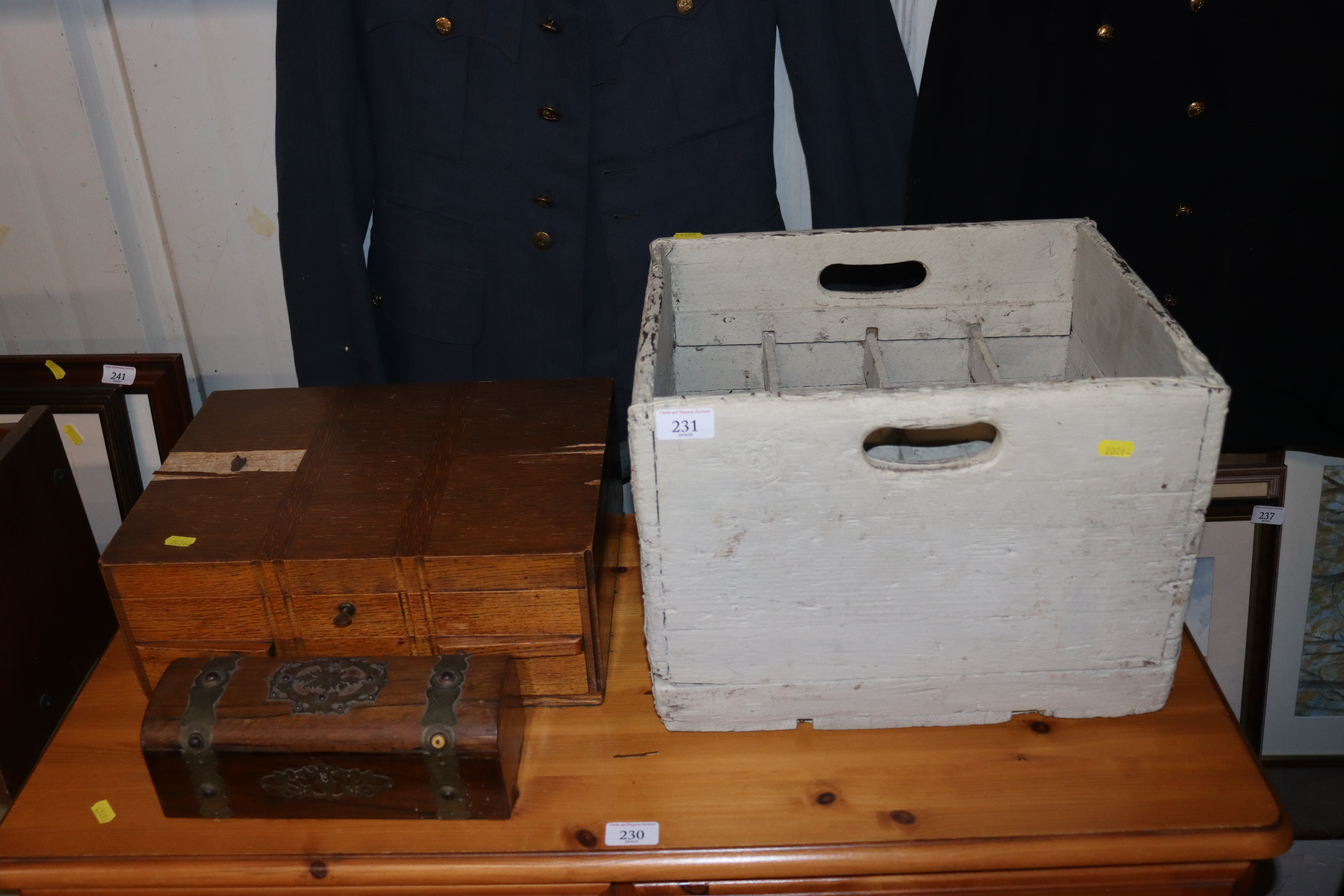 A vintage painted beer crate; an oak cased canteen