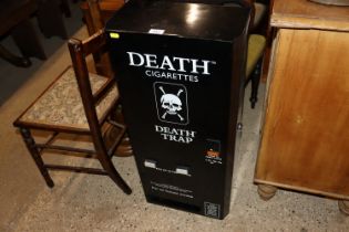 A Death Trap cigarette vending machine