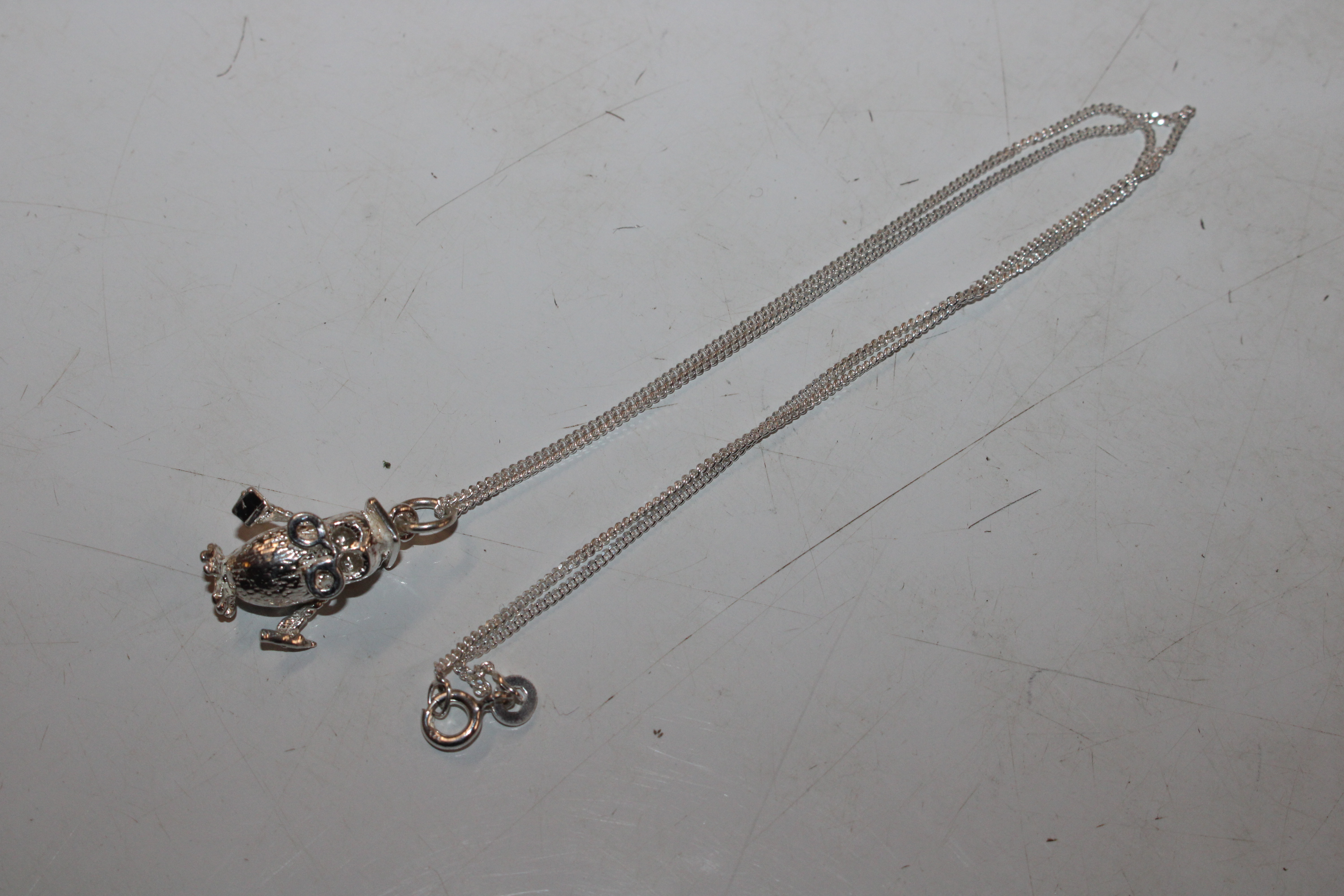 An ammonite necklace; two white metal bangles; a b - Image 17 of 29