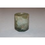 A jade coloured polished stone cup