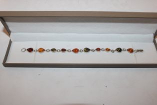 A Sterling silver and amber bracelet