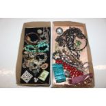 Two trays of assorted costume jewellery to include