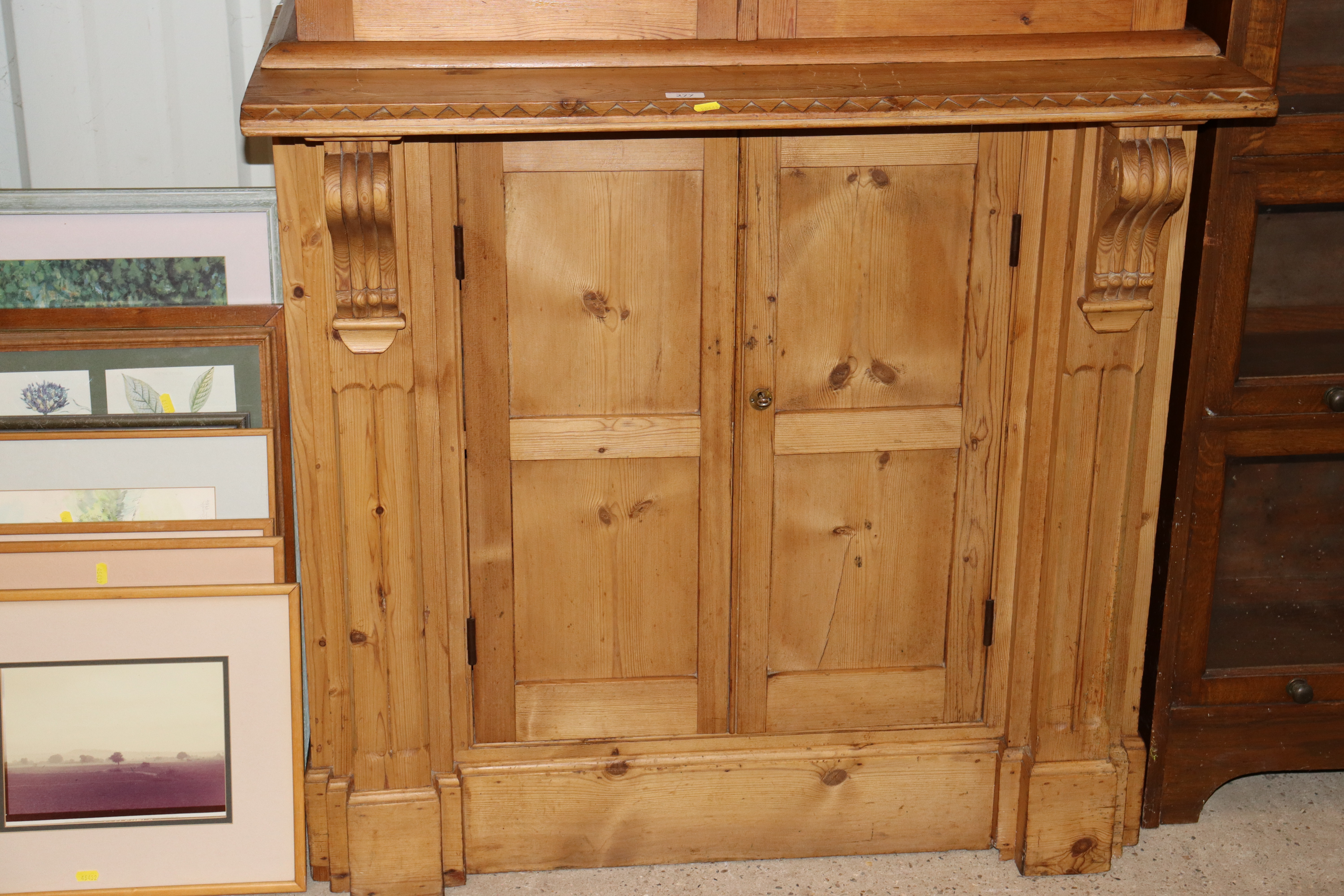 A 19th Century continental stripped pine bookcase on cupboard base - Image 2 of 4