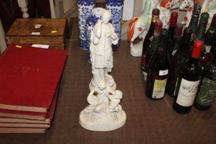 A Parian ware figure of a classical maiden; and an