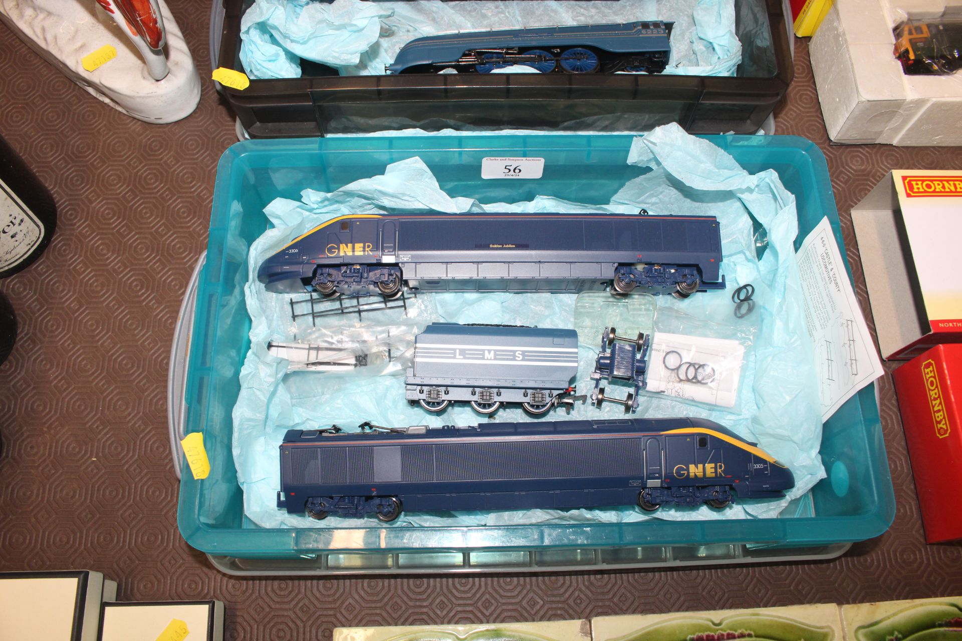 Two Hornby GNER 3306 locomotives; and carriages; and a LMS 6223 locomotive "Princess Alice" and