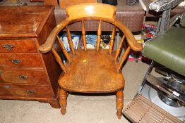 An elm seated smokers bow elbow chair