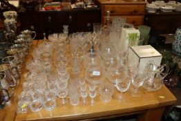 A large quantity of various table and other glassw