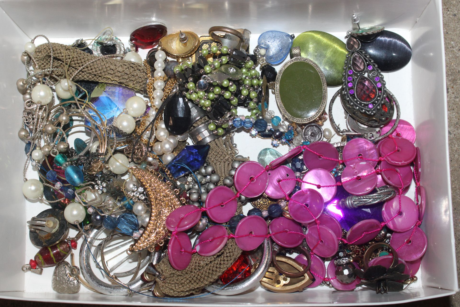 Two boxes of various costume jewellery to include