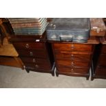 A pair of Stag four drawer bedside chests