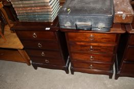 A pair of Stag four drawer bedside chests