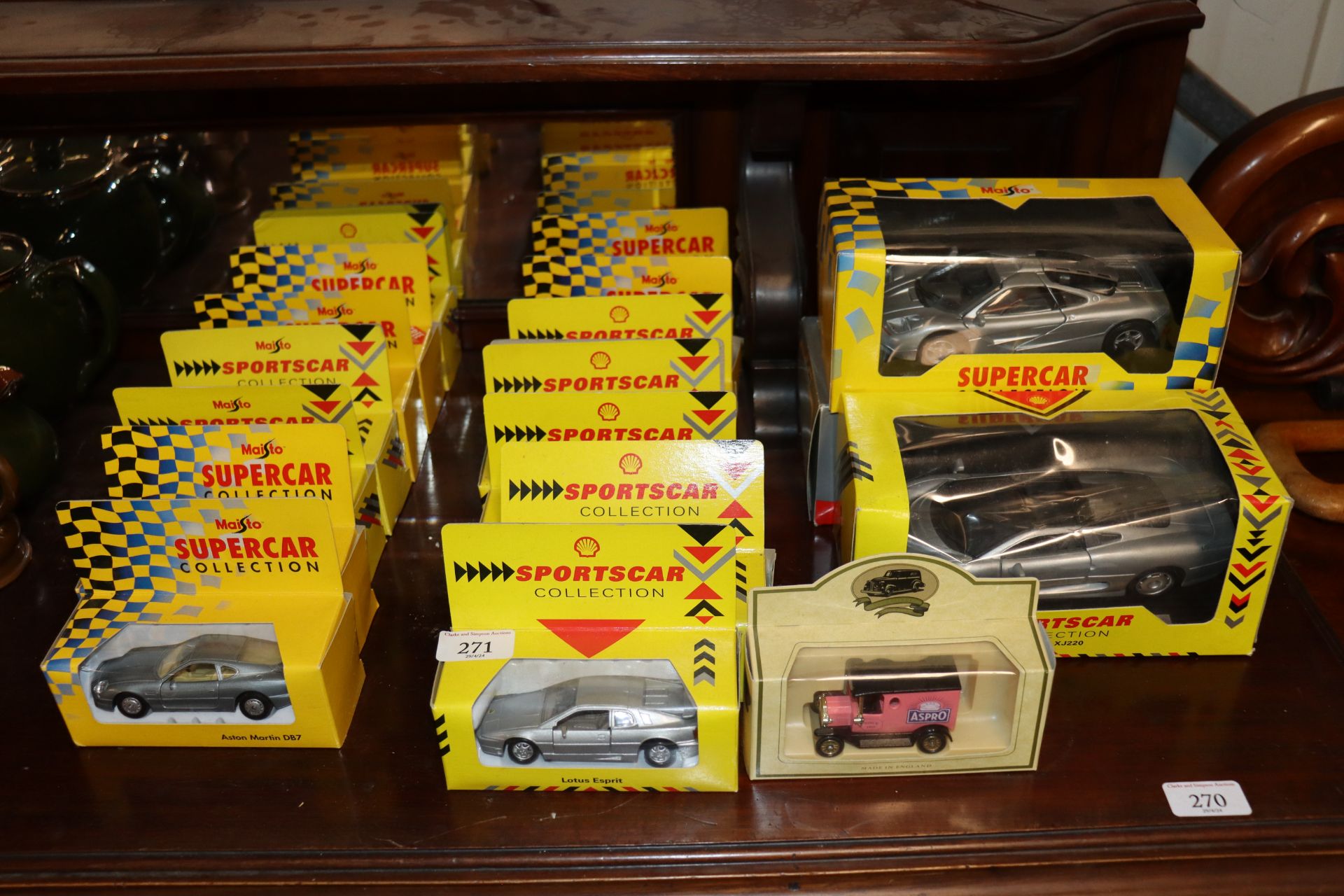 A collection of boxed Maisto and sports car collec