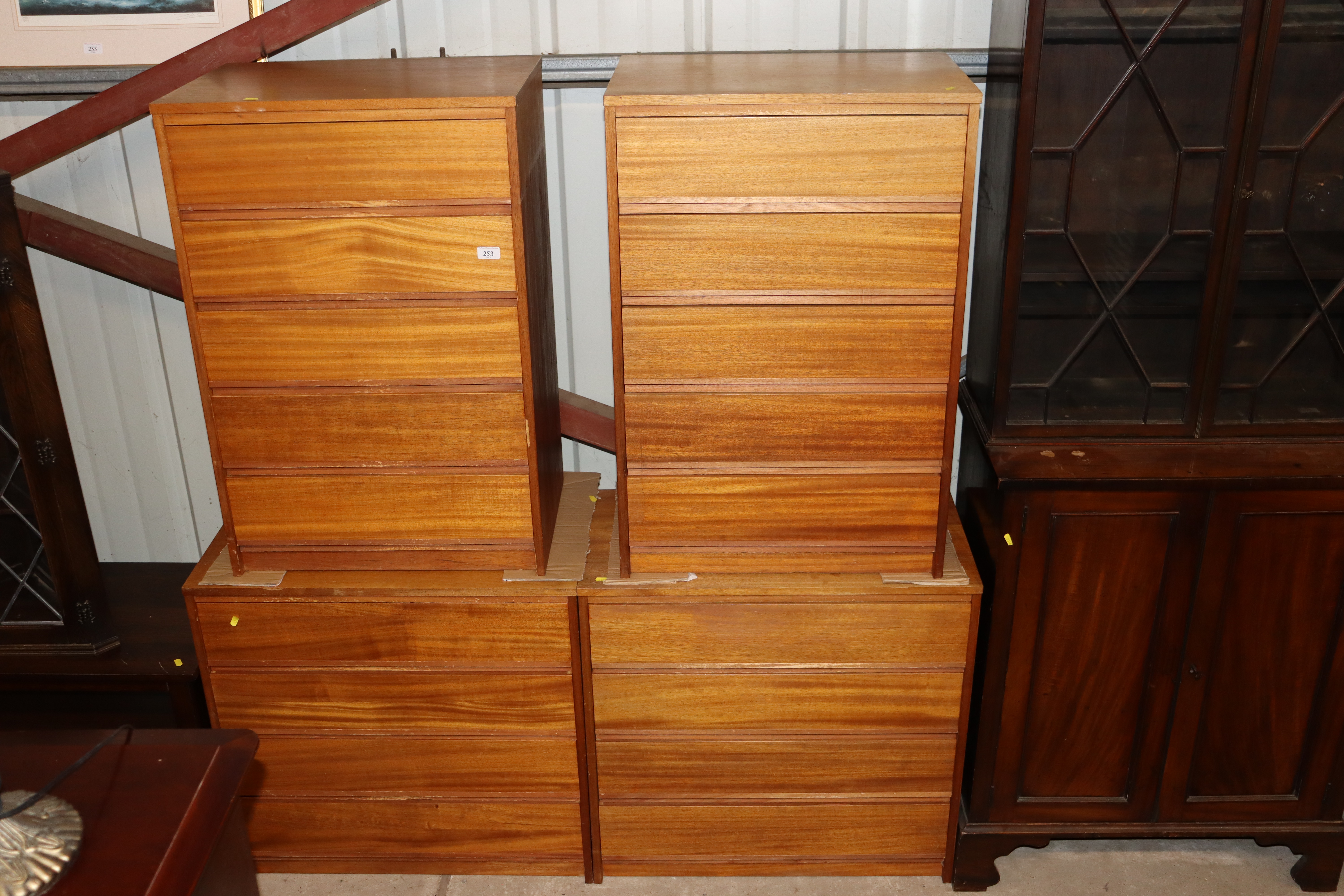 Four mid-20th Century teak chests of drawers