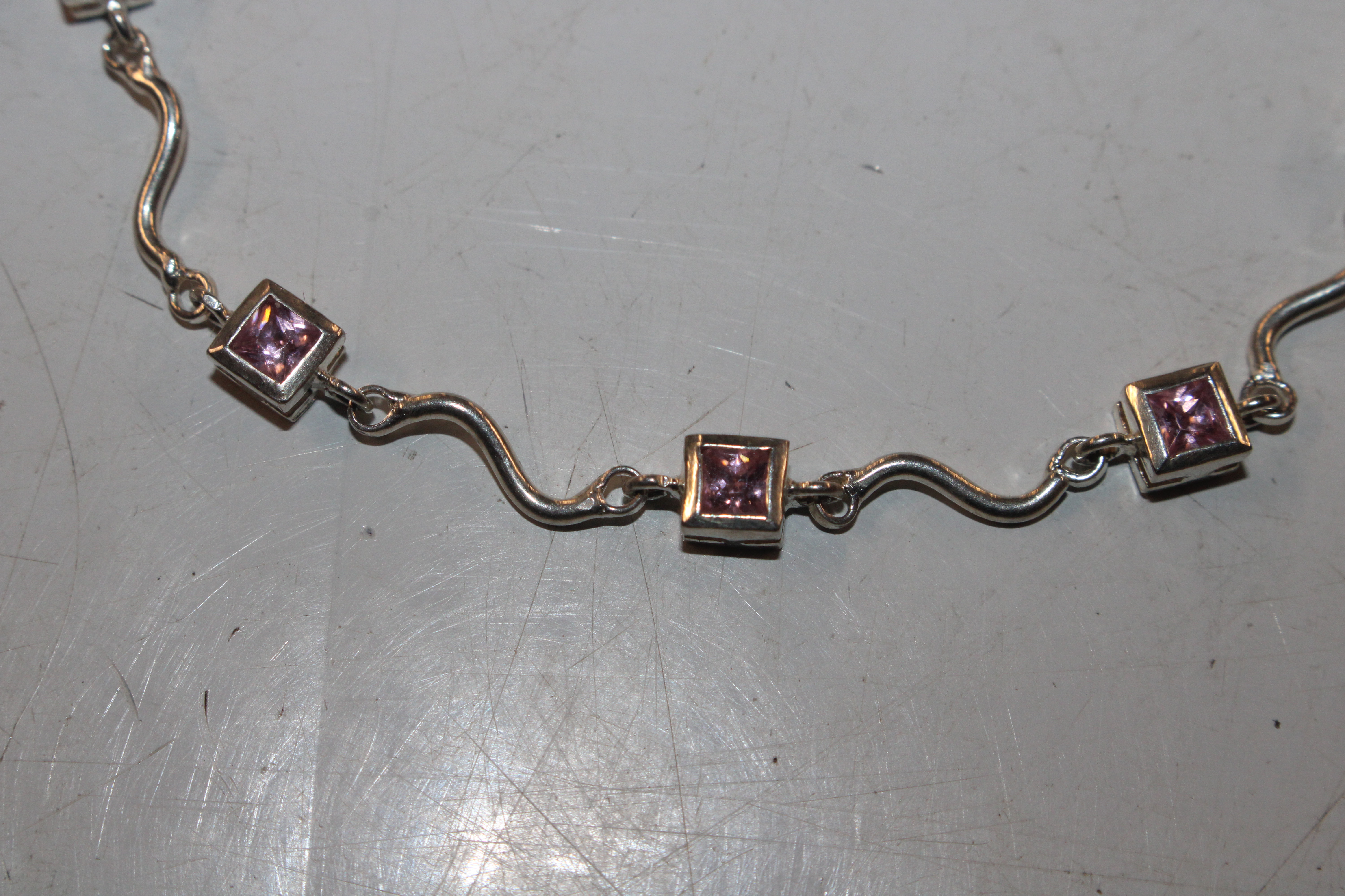 A Sterling silver and pink topaz bracelet and ear- - Image 6 of 7