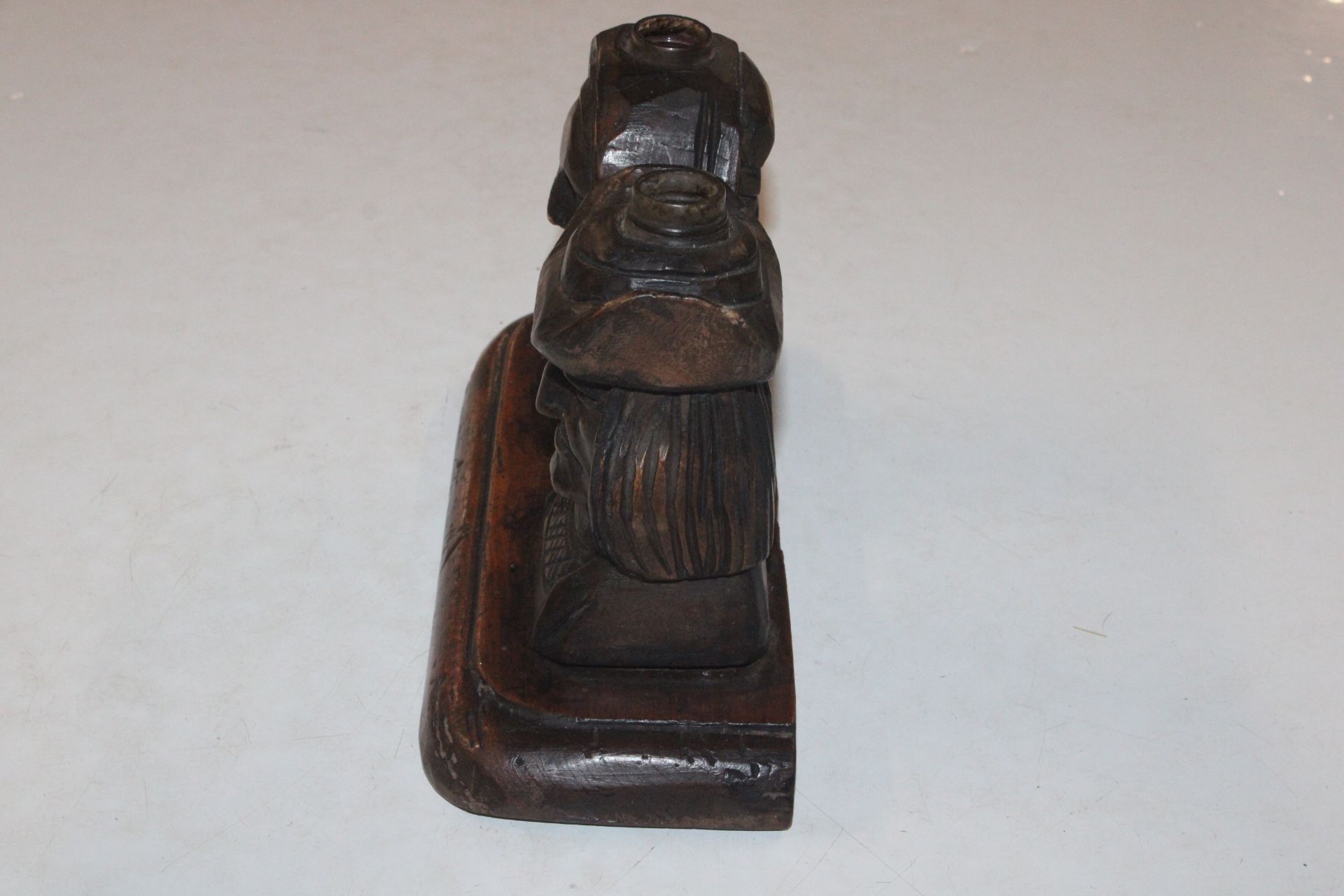 A pair of wooden stands in the form of carved head - Image 3 of 9