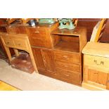 A 1930's oak bookcase / cabinet with drop flap com