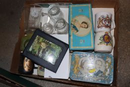 A tray box containing various royal commemorative