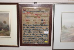 An antique needlework sampler, worked by Adele Mar