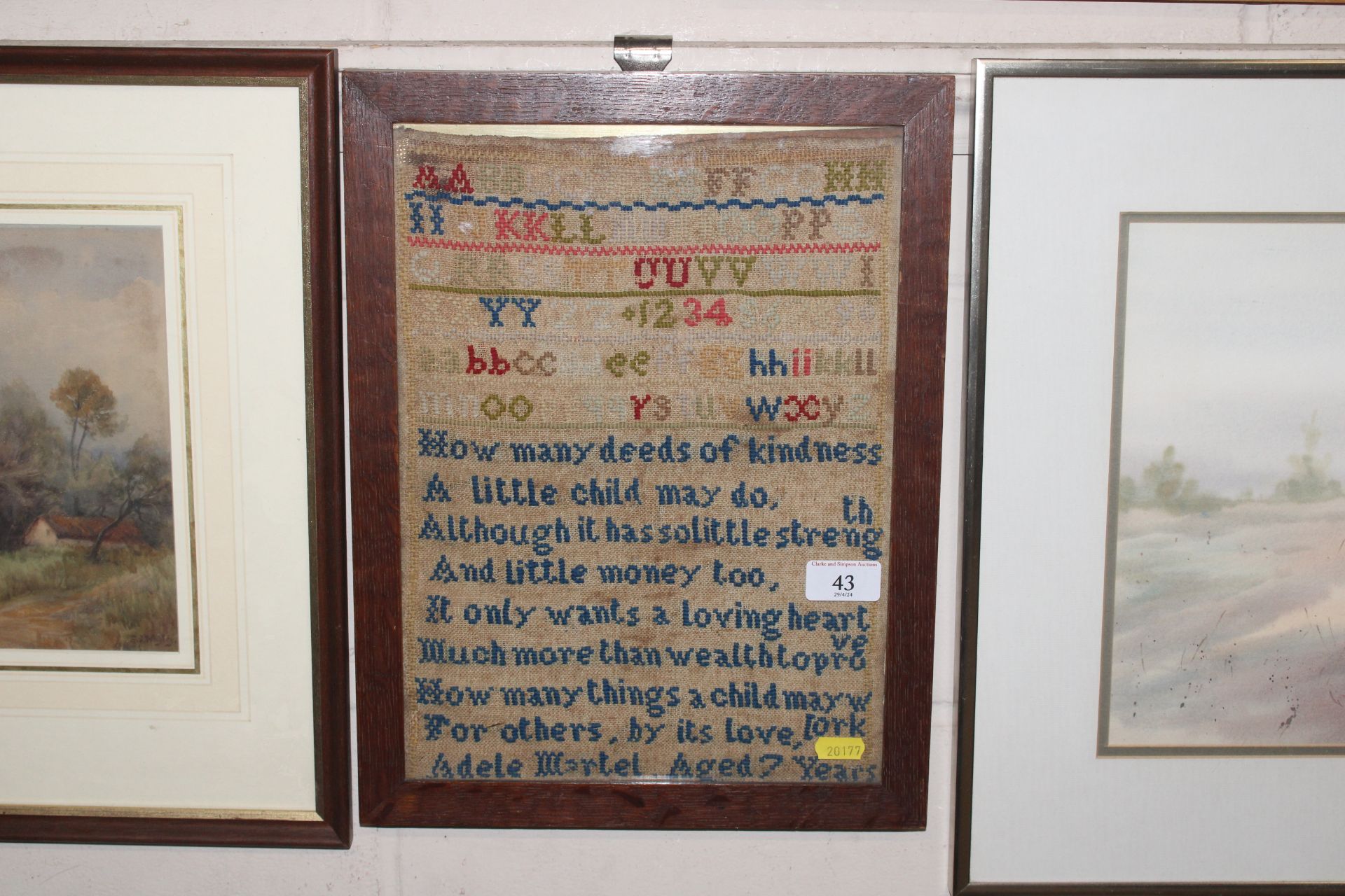 An antique needlework sampler, worked by Adele Mar