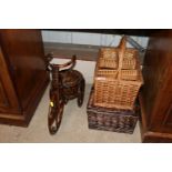 A wicker and bamboo tricycle plant stand; a wicker