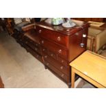 A Stag chest of three short and four long drawers