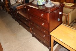 A Stag chest of three short and four long drawers