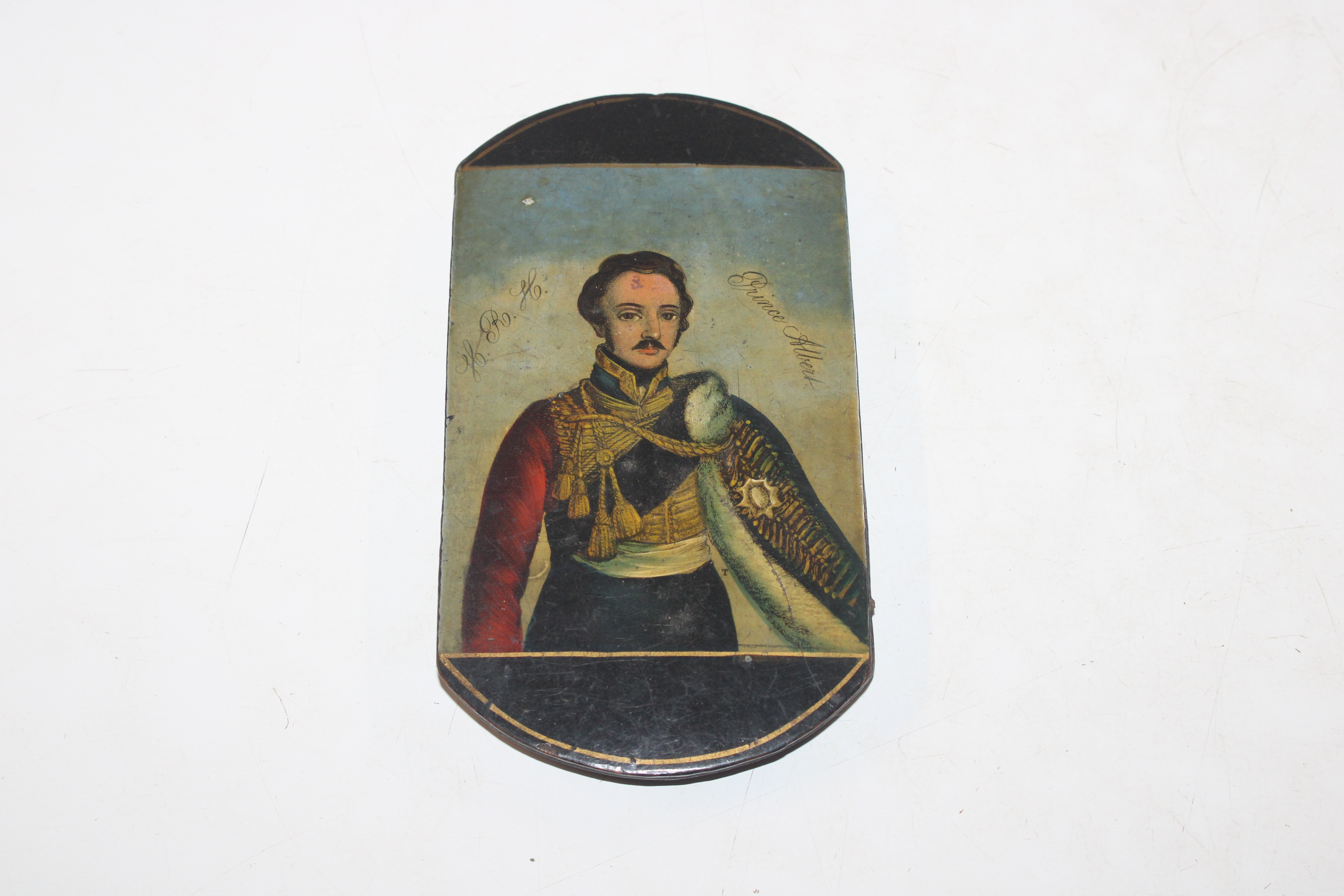 A papier mâché case decorated with Prince Albert a