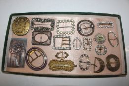 A box of vintage and other belt buckles