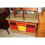 A retro style storage cabinet fitted with coloured