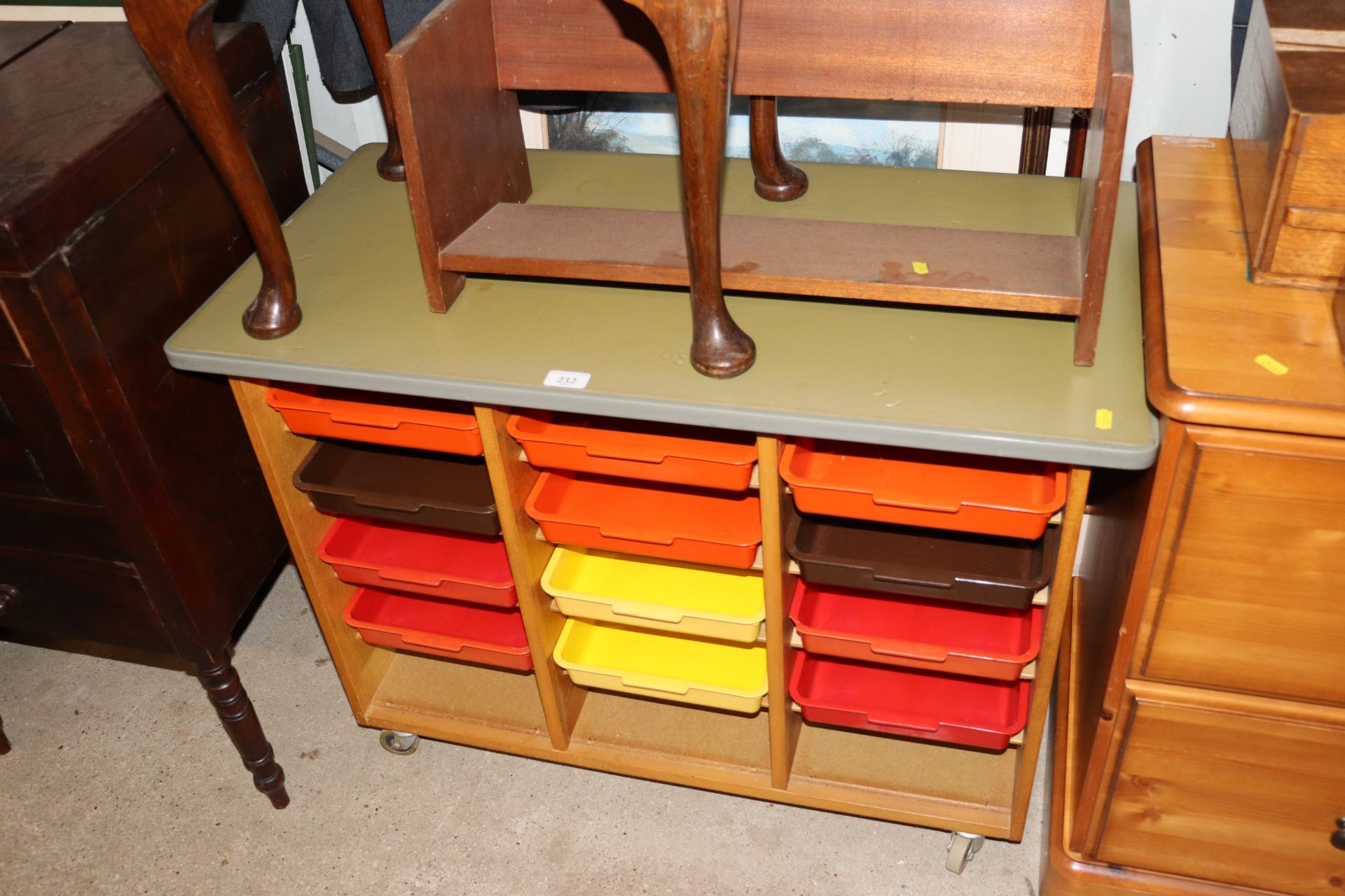 A retro style storage cabinet fitted with coloured