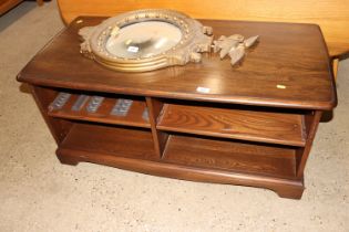 A dark Ercol home entertainment cabinet