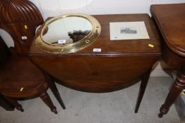 A 19th Century mahogany Pembroke table with oval d